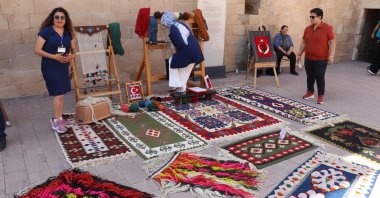 Traditional Turkish carpets are showcased at Ishak Paşa Palace in Ağrı, eastern Türkiye, July 1, 2025. (AA Photo)