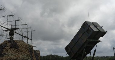 The Ukrainian Air Force's F-16 fighter jets fly over a Patriot Air and Missile Defense System in an undisclosed location in Ukraine, Aug. 4, 2024. (AP Photo)