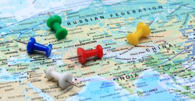 &quot;The Russia, China and Iran triangle may appear solid from a distance, but it lacks permanence.&quot; (Getty Images Photo)