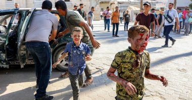 Injured Palestinian children react as they arrive at a hospital following an Israeli strike in Gaza City, in the central Gaza Strip, Palestine, July 2, 2025. (AFP Photo)