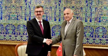 Deputy Foreign Minister Burhanettin Duran (L) shakes hands with Algerian Foreign Minister Ahmad Attaf as they meet in Algiers, Algeria, July 2, 2025. (DHA Photo)