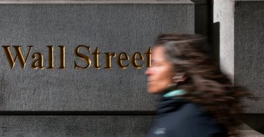 A woman walks down Wall Street, New York, U.S., April 8, 2025. (Reuters Photo)