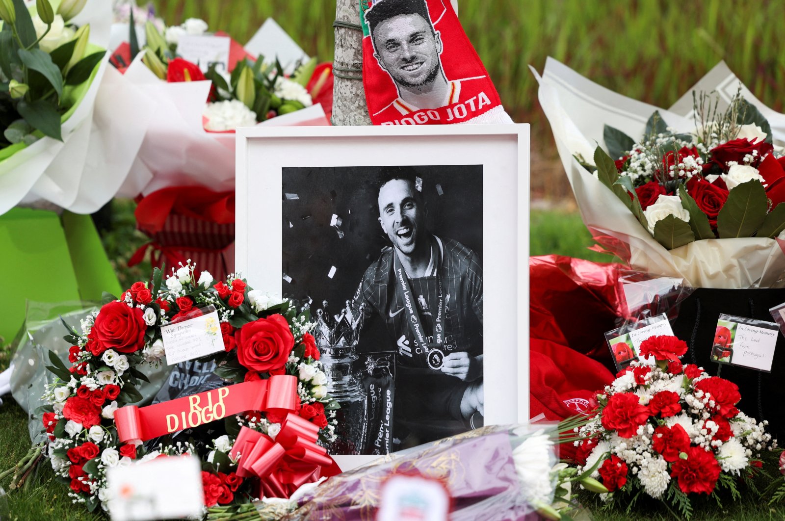Flower tributes are left outside Liverpool's Anfield Stadium after Liverpool's Portuguese player Diogo Jota died in a car crash near Zamora, Spain, Liverpool, U.K., July 4, 2025. (Reuters Photo)