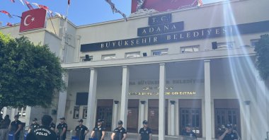 Police stand guard as authorities search the municipality building in southern Adana province, Türkiye, July 5, 2025. (AA Photo)