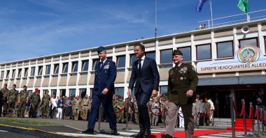 NATO Secretary-General Mark Rutte, U.S. Air Force Gen. Alexus Grynkewich and outgoing Supreme Allied Commander Europe (SACEUR) Gen. Christopher G. Cavoli, attend a ceremony where Grynkewich takes over as NATO&#039;s new Supreme Allied Commander Europe (SACEUR), at the Supreme Headquarters Allied Powers Europe (SHAPE), Casteau, Belgium July 4, 2025. (Reuters Photo)