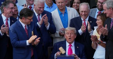 U.S. President Donald Trump uses a gavel after signing the sweeping spending and tax legislation, known as the "One Big Beautiful Bill Act," at the White House, Washington, U.S., July 4, 2025. (Reuters Photo)