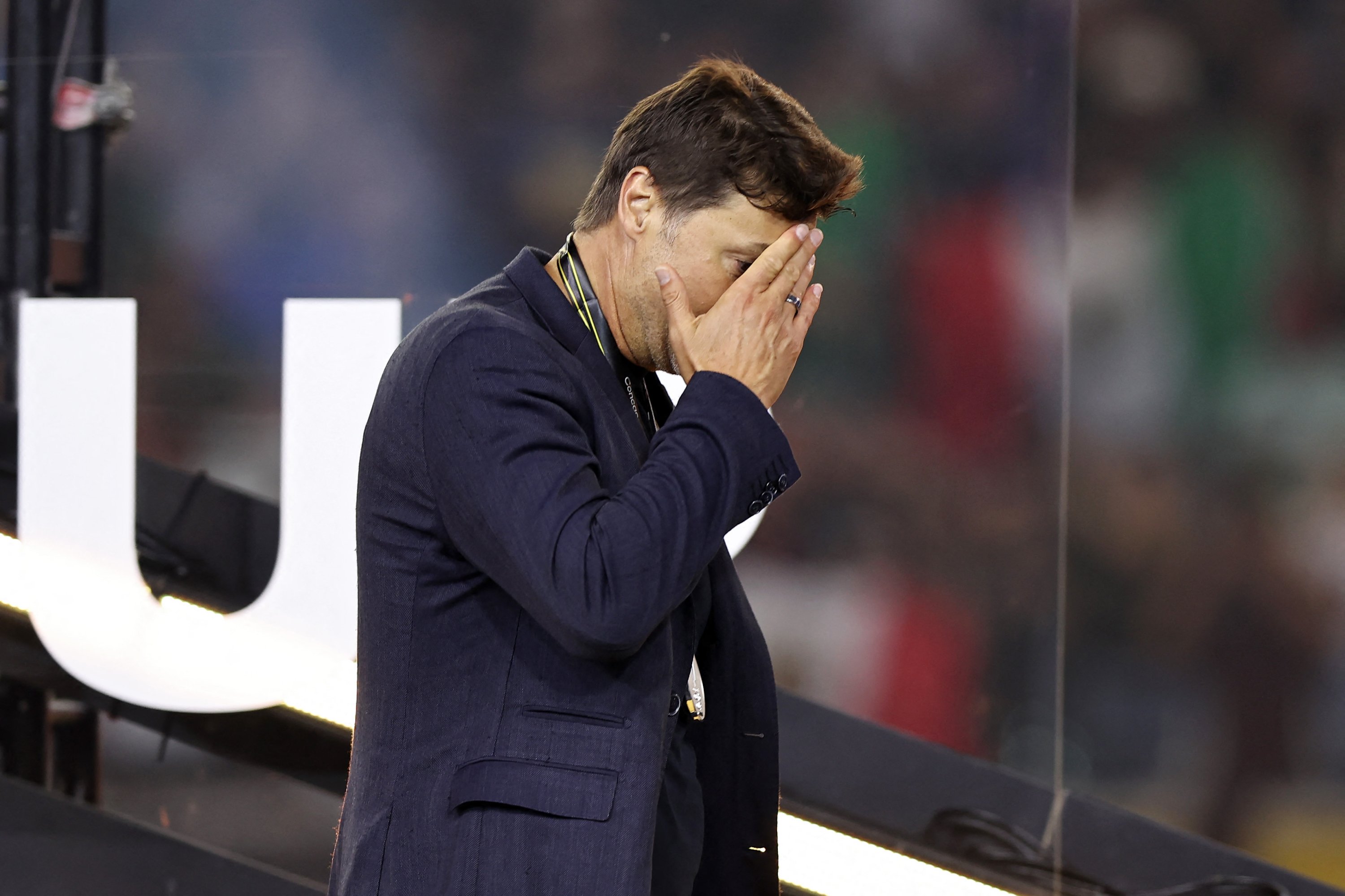 USMNT Head Coach Mauricio Pochettino walks off the stage after receiving his silver medal after a loss to Mexico in the CONCACAF Gold Cup 2025 final at NRG Stadium, Houston, U.S., July 6, 2025. (AFP Photo)