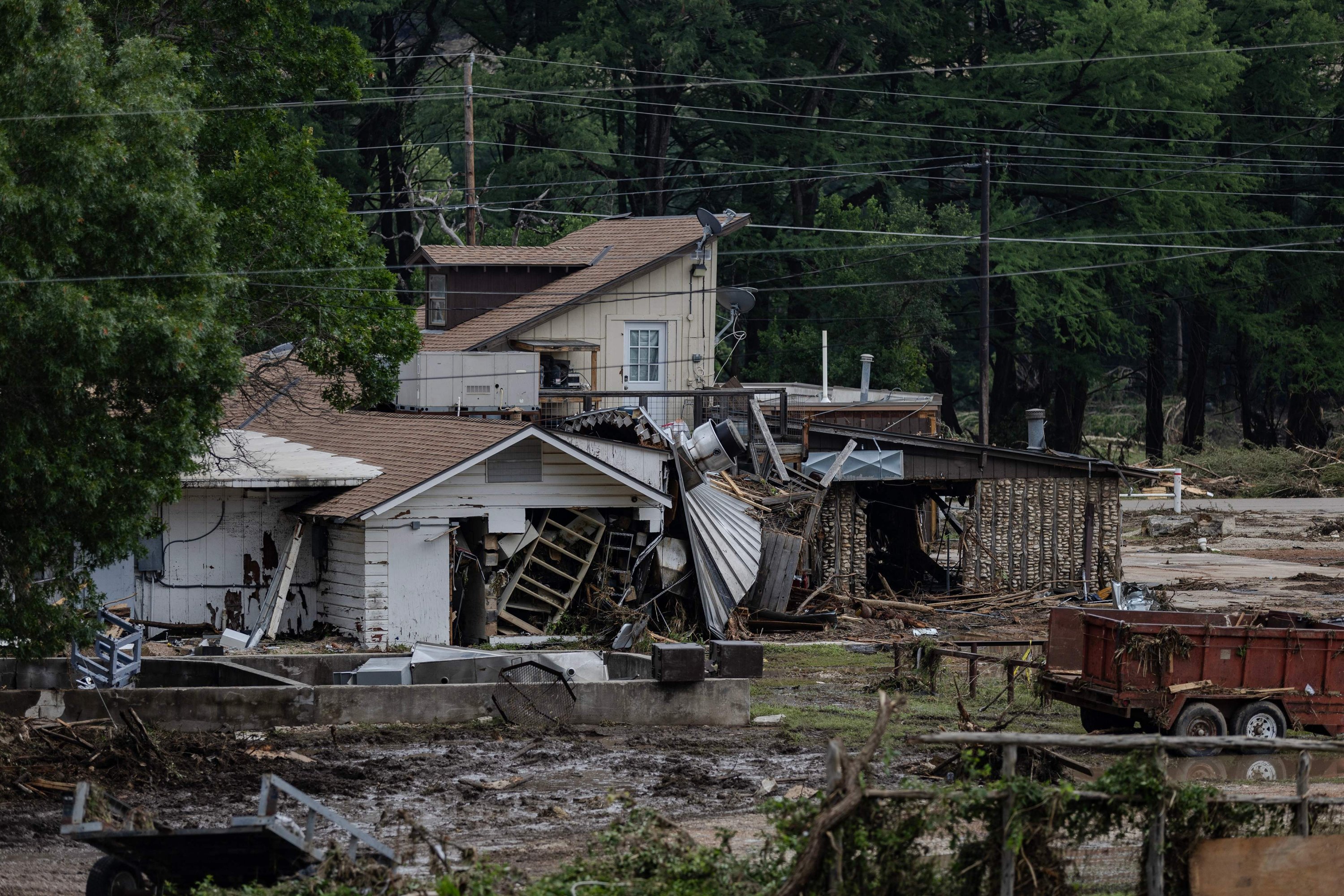 A home covered in debris sits near the town center in Hunt, Texas, July 6, 2025. (AFP Photo)