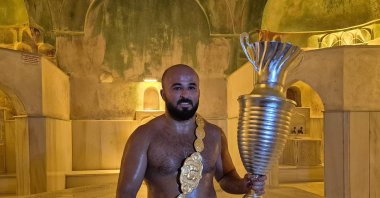 Orhan Okulu poses for a photo after claiming his third title at the 664th Kırkpınar Oil Wrestling Festival, Edirne, Türkiye, July 6, 2025. (AA Photo)