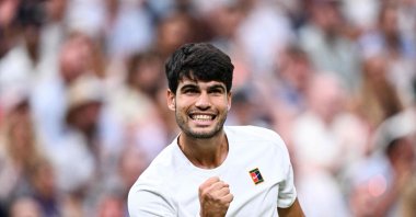Spain&#039;s Carlos Alcaraz celebrates winning a game against Russia&#039;s Andrey Rublev during their men&#039;s singles fourth-round tennis match on the seventh day of the 2025 Wimbledon Championships at The All England Lawn Tennis and Croquet Club in Wimbledon, London, U.K., July 6, 2025. (AFP Photo)