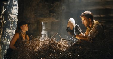 This image released by Universal Pictures and Amblin Entertainment shows Scarlett Johansson (L) and Jonathan Bailey in a scene from &quot;Jurassic World: Rebirth.&quot; (AP Photo)