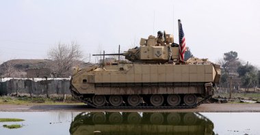 A U.S. military vehicle drives during a joint U.S.-YPG patrol in the countryside of Qamishli, northeastern Syria, Feb. 8, 2024. (Reuters Photo)