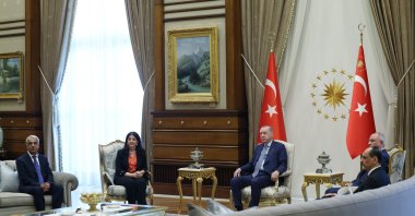 President Recep Tayyip Erdoğan receives DEM Party lawmakers Mithat Sancar (L) and Pervin Buldan (2nd L) at a meeting also attended by MIT chief Ibrahim Kalın (R) and AK Party Deputy Chair Efkan Ala (2nd R), Ankara, Türkiye, July 7, 2025. (AA Photo)