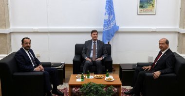 Greek Cypriot leader Nikos Christodoulides (L) and TRNC President Ersin Tatar (R) meet with U.N. Cyprus representative Colin Stewart in Ledra Palace in the U.N. buffer zone, Lefkoşa (Nicosia), Cyprus, May 5, 2025. (Reuters Photo)