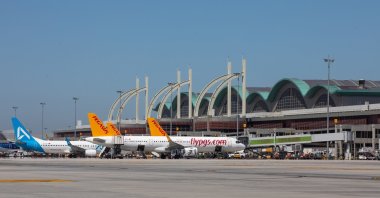 Pegasus Airlines and AJet aircraft are seen parked at the tarmac of Istanbul Sabiha Gökçen International Airport, Istanbul, Türkiye, July 8, 2025. (IHA Photo)