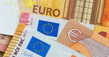 Euro banknotes are seen in this photo taken in Munich, Germany, June 27, 2025. (Reuters Photo)