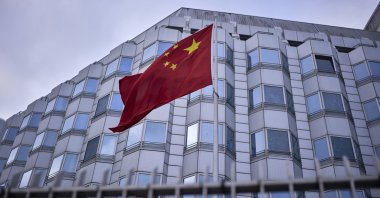 The Chinese national flag is seen in front of the country's embassy in Berlin, Germany, Thursday, April 10, 2025. (AP Photo/Markus Schreiber)