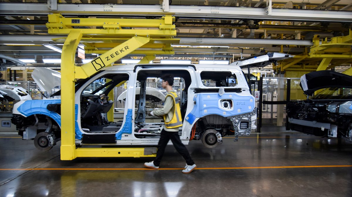 China's CPI flips into positive, but factory price deflation deepens