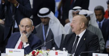 Armenian Prime Minister Nikol Pashinyan (L) and Azerbaijani President Ilham Aliyev attend the Outreach/BRICS Plus format session at the BRICS summit, Kazan, Russia, Oct. 24, 2024. (AP Photo)