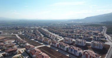 Workers reconstruct homes and businesses at 3,481 sites across 11 quake-hit provinces, as Türkiye aims to deliver over 450,000 new units by year’s end, Gaziantep, Türkiye, June 21. 2025. (AA Photo)