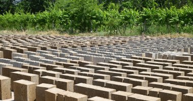 A view of the production facility of rice construction blocks, made mostly of rice husks – a byproduct of rice processing, in the Batken region, southern Kyrgyzstan, May 22, 2025. (AFP Photo)