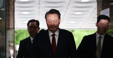 Former South Korean President Yoon Suk Yeol (C) arrives at court to attend a hearing to review his arrest warrant requested by special prosecutors in Seoul, South Korea, July 9, 2025. (EPA Photo)