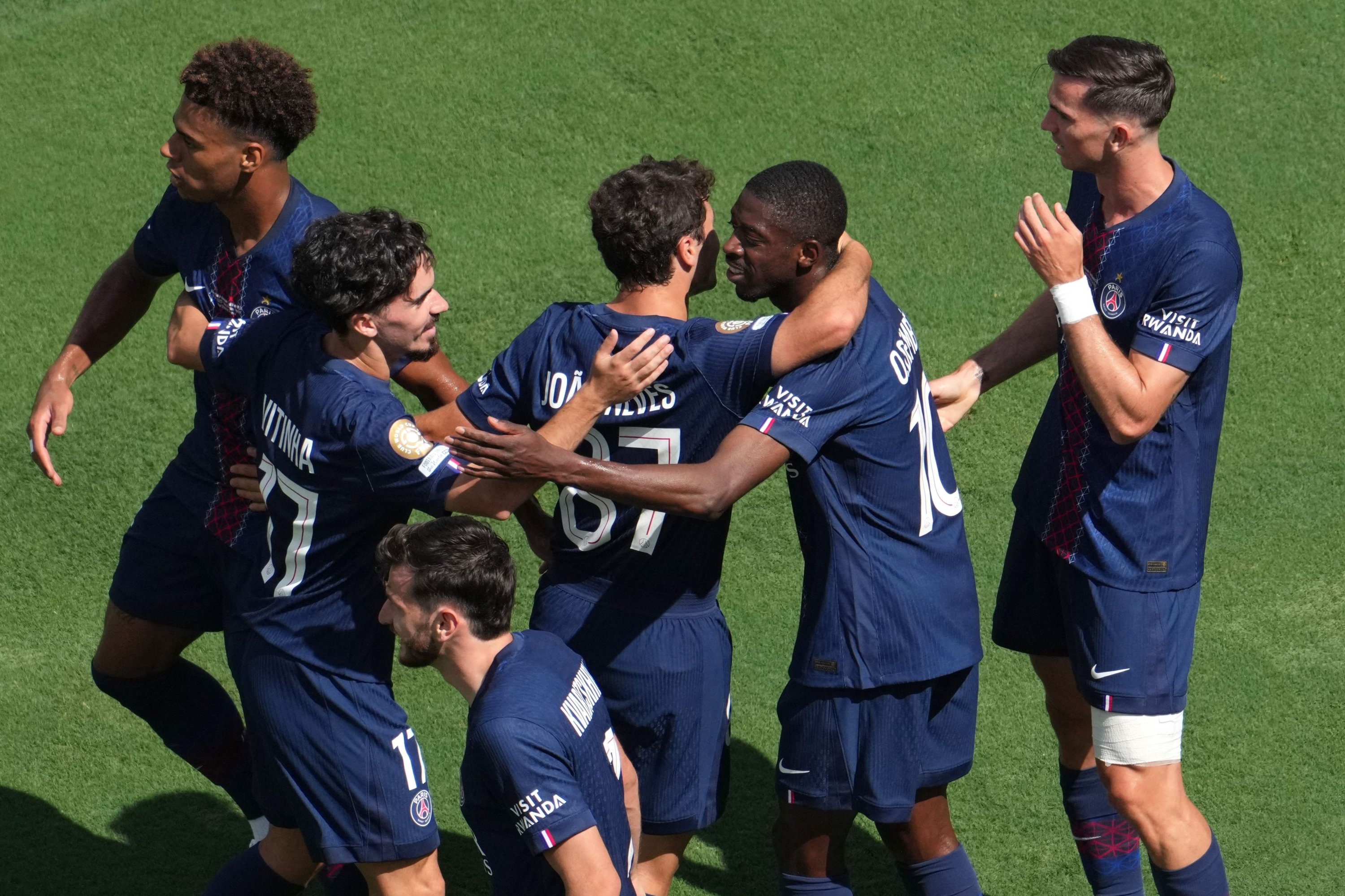 Paris Saint-Germain's Ousmane Dembele (2nd R) celebrates scoring his team's second goal with teammates during the FIFA Club World Cup 2025 semifinal football match against Real Madrid at MetLife Stadium, East Rutherford, U.S., July 9, 2025. (AFP Photo)