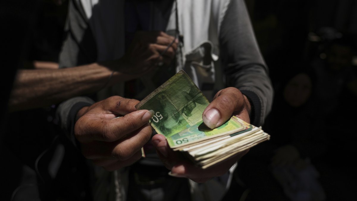 Gaza’s economy struggles to stay afloat amid rising fees, cash scarcity