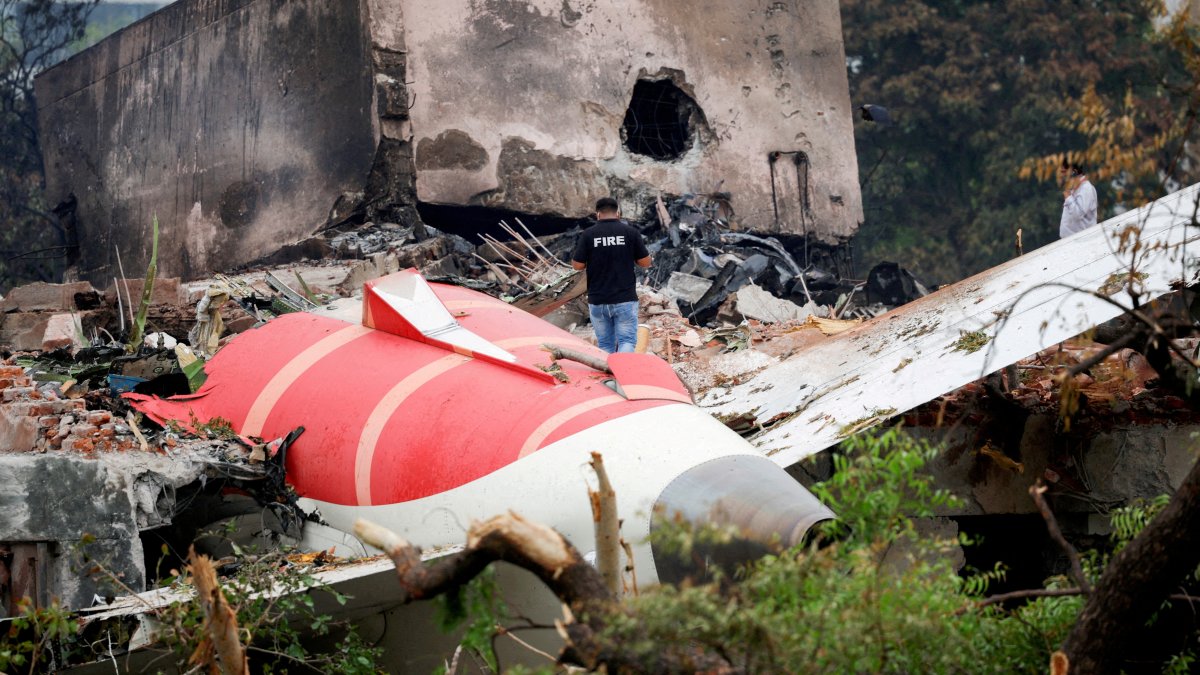 A firefighter stands next to the crashed Air India Boeing 787-8 Dreamliner aircraft, in Ahmedabad, India, June 13, 2025. (Reuters File Photo)