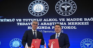 Justice Minister Yılmaz Tunç (R) and Health Minister Kemal Memişoğlu sign a cooperation protocol on treatment and research centers for addicted inmates, Ankara, Türkiye, July 10, 2025. (AA Photo) 