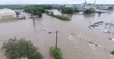 A drone view of vehicles partially submerged in floodwater following torrential rains that unleashed flash floods along the Concho River in San Angelo, Texas, U.S., July 4, 2025. (Reuters Photo)