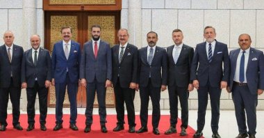 A Union of Chambers and Commodity Exchanges of Türkiye (TOBB) delegation is welcomed by Syrian President Ahmad al-Sharaa (4th L), Damascus, Syria, July 11, 2025. (AA Photo)