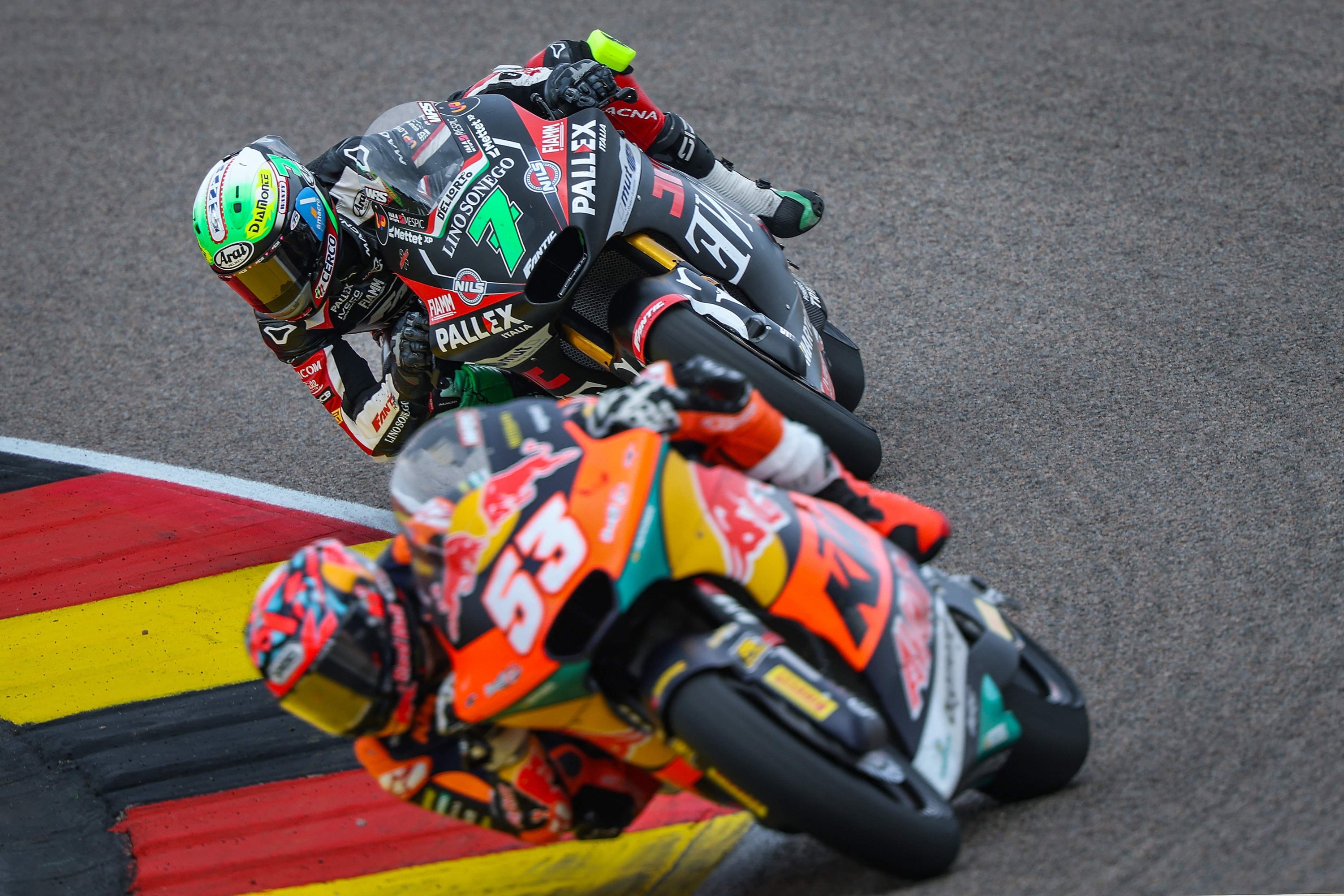 Red Bull KTM Ajo Team's Turkish Moto2 rider Deniz Öncü leads during the German Moto2 Grand Prix at the Sachsenring racing circuit, Hohenstein-Ernstthal, Germany, July 13, 2025. (AFP Photo)
