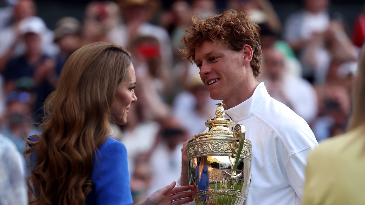 Italy&#039;s Jannik Sinner receives his trophy from Britain&#039;s Catherine, Princess of Wales, after winning the Men&#039;s Singles final match against Spain&#039;s Carlos Alcaraz at the Wimbledon Championships, London, U.K., July 13, 2025. (EPA Photo)