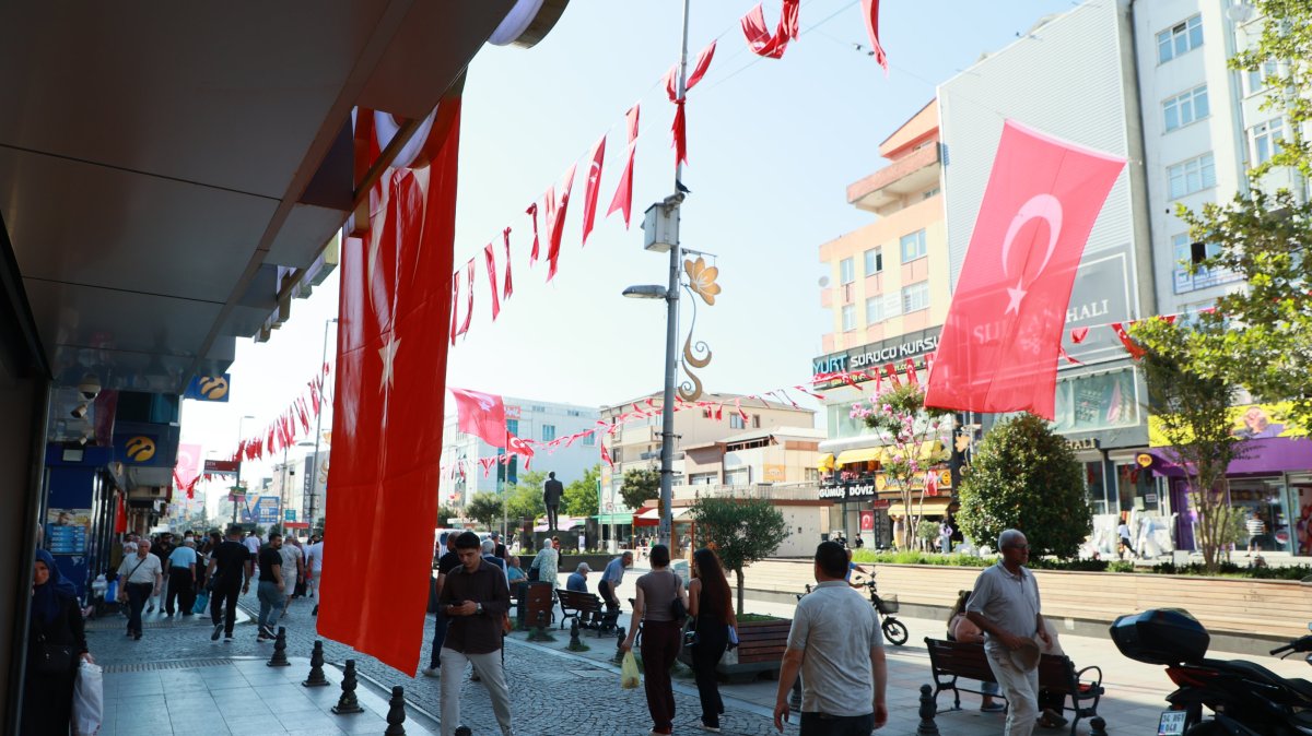 People walking through a busy street in Istanbul, Türkiye, July 12, 2025. (AA Photo)