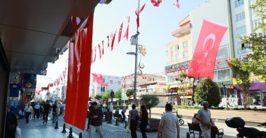 People walking through a busy street in Istanbul, Türkiye, July 12, 2025. (AA Photo)
