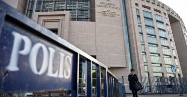 A woman walks in front of the city&#039;s main courthouse on the European side, Istanbul, Türkiye, Dec. 11, 2019. (AFP Photo)