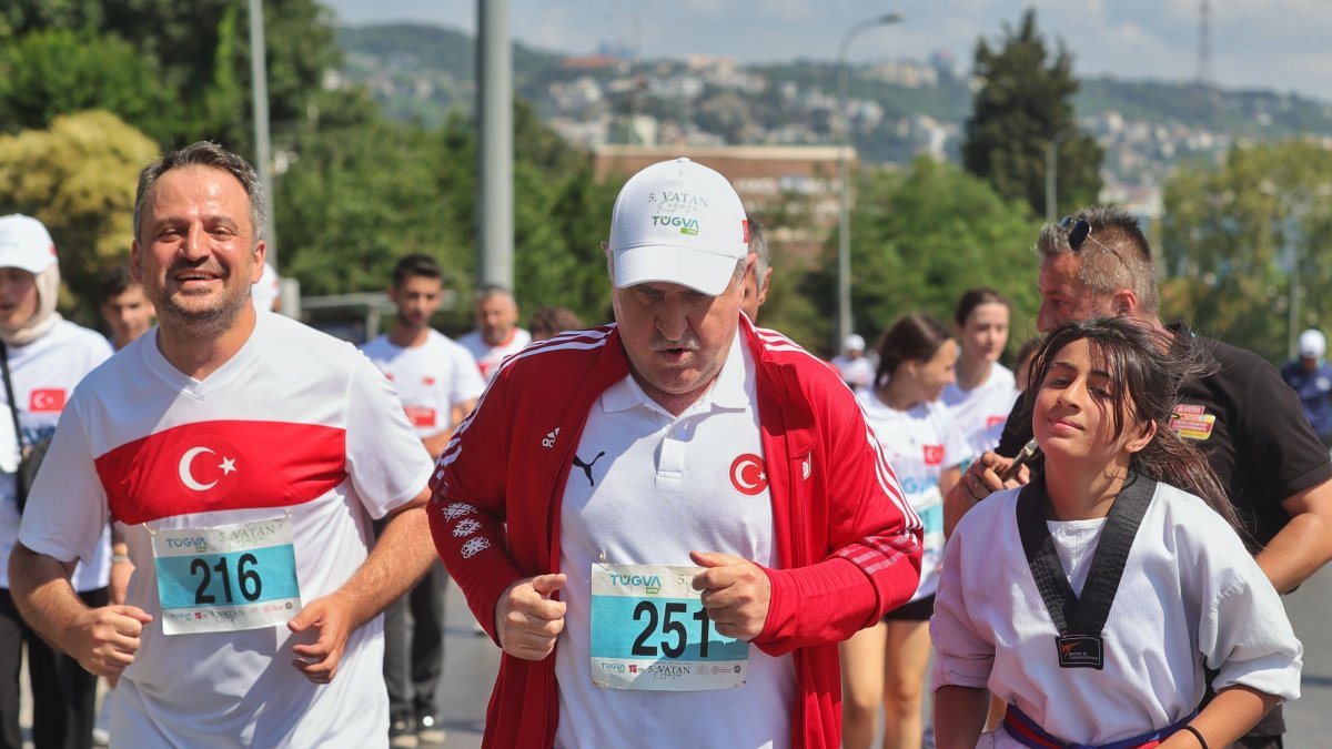 Youth and Sports Minister Osman Aşkın Bak participates in the Vatan Koşusu, Istanbul, Türkiye, July 15, 2025. (AA Photo)