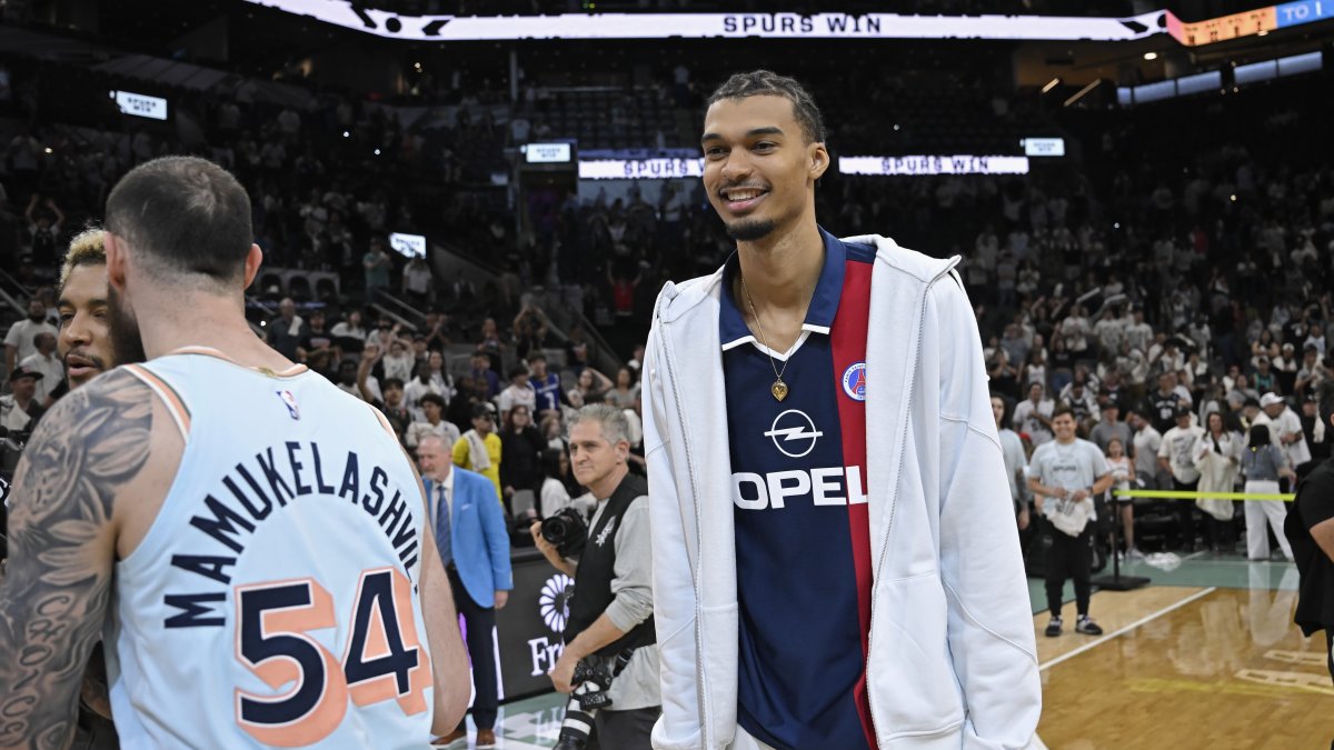 San Antonio Spurs forward Victor Wembanyama (R) walks on the court after an NBA basketball game against the Toronto Raptors, San Antonio, U.S., April 13, 2025. (AP Photo)