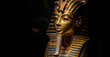 This picture taken on Nov. 6, 2022, shows a view of the gold burial mask of the ancient Egyptian New Kingdom Pharaoh Tutankhamun (1334-1325 B.C.) on display at the Egyptian Museum in the center of Egypt&#039;s capital, Cairo. (AFP Photo)