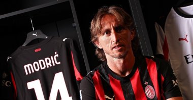 Luka Modric poses for a photo after signing for AC Milan, Milan, Italy, July 14, 2025. (IHA Photo)