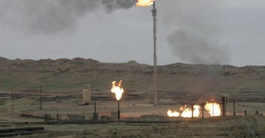 Flames rise from a pipeline of the Baba-Gargur oil field in Kirkuk, north of Baghdad, Iraq, Dec. 17, 2009. (Reuters File Photo)