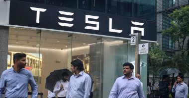 People walk outside the newly inaugurated Tesla car showroom, Mumbai, India, July 15, 2025. (EPA Photo)