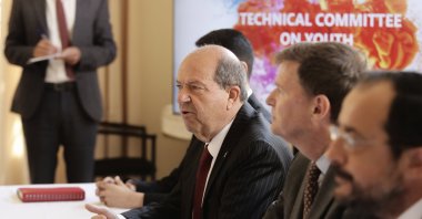 Greek Cypriot leader Nikos Christodoulides (R) and TRNC President Ersin Tatar (3rd R) talk with the U.N. special representative (2nd R), Lefkoşa (Nicosia), Cyprus, May 5, 2025. (AP Photo)
