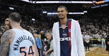 San Antonio Spurs forward Victor Wembanyama (R) walks on the court after an NBA basketball game against the Toronto Raptors, San Antonio, U.S., April 13, 2025. (AP Photo)