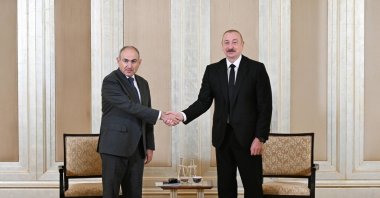 Armenian Prime Minister Nikol Pashinyan (L) meets with Azerbaijani President Ilham Aliyev (R), Abu Dhabi, United Arab Emirates (UAE), July 10, 2025. (Azerbaijan President Press Service Handout via EPA Photo)