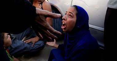 People mourn Palestinians who were killed in an incident while seeking aid in Khan Younis, in Khan Younis, southern Gaza Strip, July 16, 2025. (Reuters Photo)
