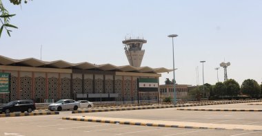 A view of the front facade of the terminal at Damascus International Airport and the control tower following improvements next to a painting of the new Syrian flag, Damascus, Syria, June 10, 2025. (Reuters Photo)