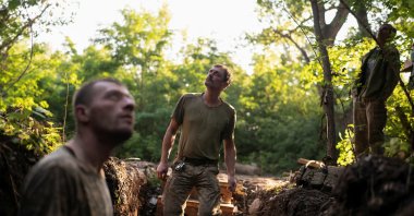 Ukraine artillerymen look out for Russian combat drones on the front line near Kostiantynivka, in Donetsk region, Ukraine, July 5, 2025. (Reuters Photo)