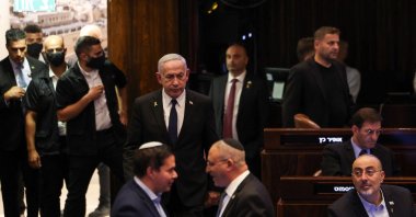 Israeli Prime Minister Benjamin Netanyahu walks at the plenum in the Knesset, Israel&#039;s parliament, ahead of a vote in Jerusalem, July 14, 2025. (Reuters Photo)